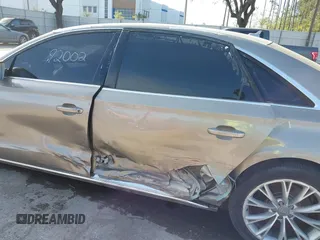 2012 Audi A8 z VIN WAURVAFD3CN024063, wystawiony jako IAAI lot #41706508 z przebiegiem Nie podano mil oraz . Historia ofert i sprzedaży dostępna na DreamBid. Obrazek 6.