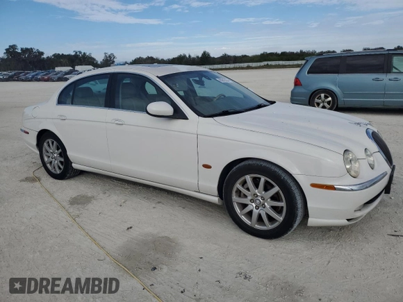 2003 Jaguar S-Type z VIN SAJEA01UX3HM59287, wystawiony jako Copart lot #85619554 z przebiegiem 182 851 mil mil oraz Tytuł czysty. Historia ofert i sprzedaży dostępna na DreamBid. Obrazek 4.