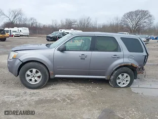 2008 Mercury Mariner with VIN 4M2CU91118KJ13477, listed as a IAAI auction lot 41987552 with 130,238 mi miles. Bid and sale history available at carsss.com. Image 14.