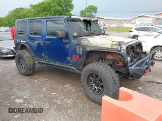 2007 Jeep Wrangler Unlimited X with VIN 1J4GA39167L138041, listed as a IAAI auction lot 42113260 with Not provided miles and . Bid and sale history available at DreamBid. Image 1.