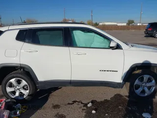 2019 Jeep Compass Latitude with VIN 3C4NJDBB5KT704564, listed as a IAAI auction lot 40768531 with 95,291 mi miles. Bid and sale history available at carsss.com. Image 13.
