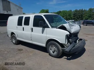 2014 Chevrolet Express Cargo Van with VIN 1GCWGFCA2E1210307, listed as a IAAI auction lot 39559260 with 213,814 mi miles. Bid and sale history available at carsss.com. Image 1.