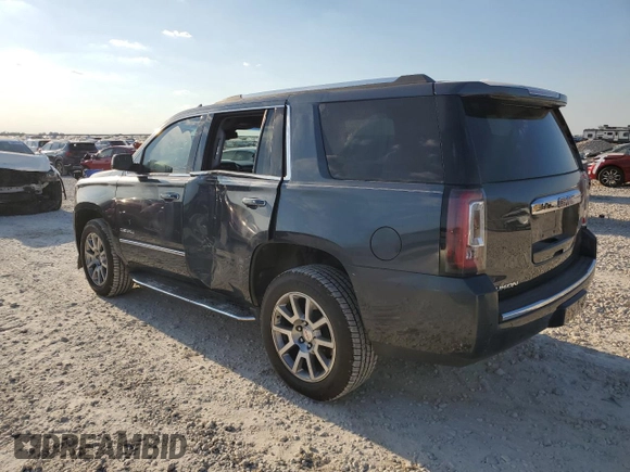 2019 GMC Yukon Denali with VIN 1GKS1CKJ9KR134571, listed as a Copart auction lot 73275664 with 50,853 mi miles and Salvage Title. Bid and sale history available at carsss.com. Image 2.