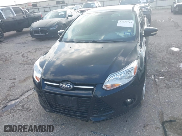 2014 Ford Focus Titanium z VIN 1FADP3N28EL208034, wystawiony jako IAAI lot #42426943 z przebiegiem 220 891 mil mil oraz . Historia ofert i sprzedaży dostępna na DreamBid. Obrazek 6.