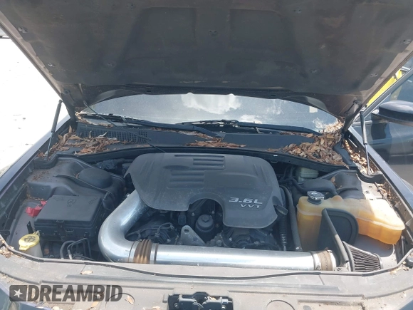 2013 Chrysler 300 with VIN 2C3CCAAG7DH685108, listed as a IAAI auction lot 42375248 with Not provided miles and . Bid and sale history available at DreamBid. Image 10.