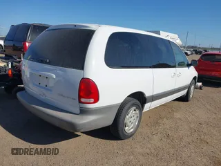 1999 Dodge Caravan SE with VIN 1B4GP44G7XB561333, listed as a IAAI auction lot 42011411 with Not Provided miles and . Bid and sale history available at carsss.com. Image 4.