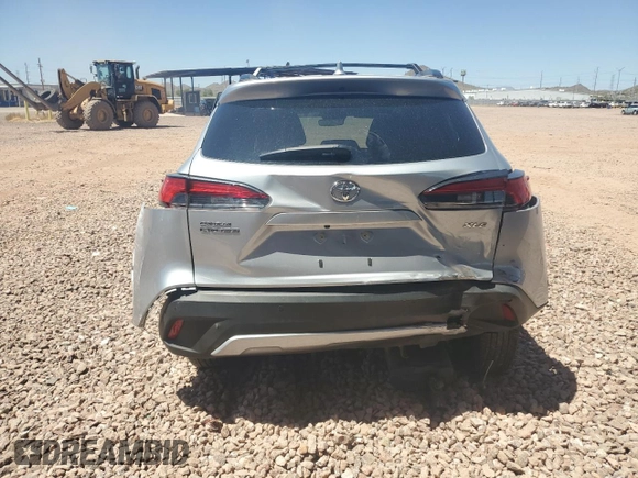 2023 Toyota Corolla Cross XLE with VIN 7MUDAAAG2PV050945, listed as a Copart auction lot 62237465 with 33,036 mi miles and Salvage title. Bid and sale history available at DreamBid. Image 6.