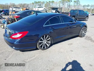2013 Mercedes-Benz CLS-Class CLS 550 with VIN WDDLJ9BB7DA074616, listed as a IAAI auction lot 41750371 with 112,898 mi miles. Bid and sale history available at carsss.com. Image 4.