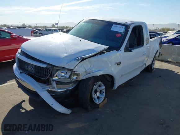 1999 Ford F-150 XL с VIN 1FTRX18L0XKB29703, выставлен на аукционе IAAI как лот 41644163 с пробегом Не указан миль и . История ставок и продаж доступна на DreamBid. Изображение 2.