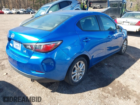 2016 Scion iA with VIN 3MYDLBZV0GY126847, listed as a IAAI auction lot 41588599 with 137,966 mi miles. Bid and sale history available at carsss.com. Image 4.