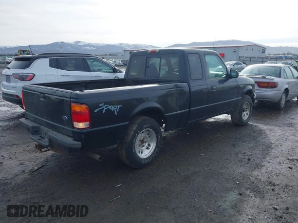 1999 Ford Ranger XLT with VIN 1FTYR14X8XPA58509, listed as a IAAI auction lot 41648097 with 164,241 mi miles. Bid and sale history available at carsss.com. Image 4.