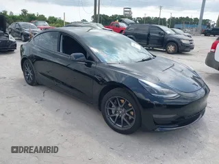 2023 Tesla Model 3 with VIN 5YJ3E1EA0PF571330, listed as a IAAI auction lot 42198817 with 39,682 mi miles and . Bid and sale history available at DreamBid. Image 1.