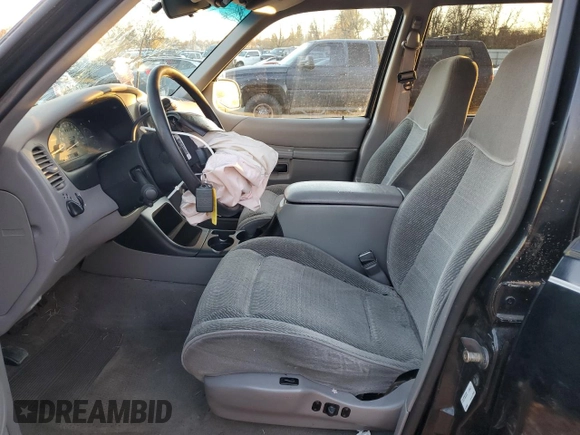 1997 Ford Explorer XL with VIN 1FMDU34E8VUC95969, listed as a Copart auction lot 83269784 with 174,035 mi miles and Salvage title. Bid and sale history available at DreamBid. Image 7.