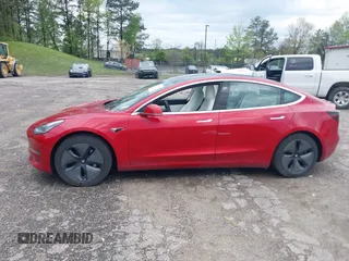 2020 Tesla Model 3 Long Range z VIN 5YJ3E1EB7LF668172, wystawiony jako IAAI lot #42002676 z przebiegiem 61 672 mil mil oraz . Historia ofert i sprzedaży dostępna na DreamBid. Obrazek 14.