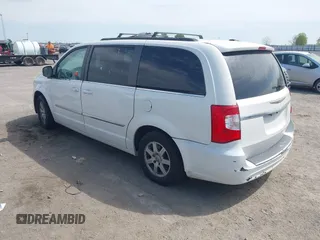 2012 Chrysler Town & Country Touring L with VIN 2C4RC1CG7CR156415, listed as a IAAI auction lot 42045371 with 233,306 mi miles and . Bid and sale history available at carsss.com. Image 3.