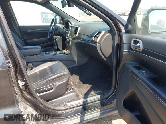 2014 Jeep Grand Cherokee Limited with VIN 1C4RJFBG6EC259468, listed as a IAAI auction lot 42489790 with 263,060 mi miles and . Bid and sale history available at DreamBid. Image 5.