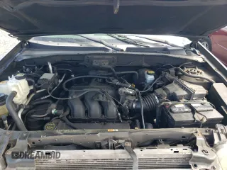 2003 Ford Escape XLT Popular 2 with VIN 1FMYU93133KB35168, listed as a Copart auction lot 57303335 with 197,368 mi miles and Salvage title. Bid and sale history available at DreamBid. Image 12.