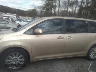 2011 Toyota Sienna XLE with VIN 5TDDK3DC3BS029476, listed as a IAAI auction lot 41393568 with 124,328 mi miles. Bid and sale history available at carsss.com. Image 14.