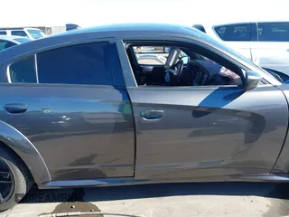 2022 Dodge Charger Scat Pack Widebody with VIN 2C3CDXGJ1NH204130, listed as a IAAI auction lot 41392893 with 9,515 mi miles and . Bid and sale history available at DreamBid. Image 13.