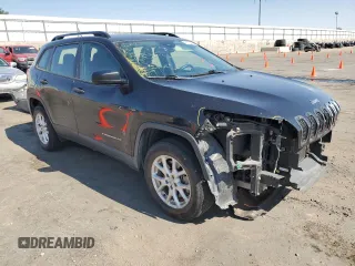 2015 Jeep Cherokee Sport with VIN 1C4PJMAB7FW773265, listed as a Copart auction lot 61134045 with 117,628 mi miles and Salvage title. Bid and sale history available at DreamBid. Image 4.