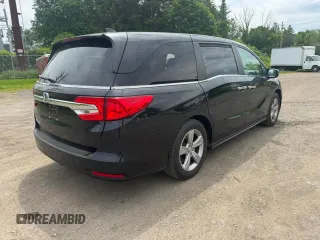2019 Honda Odyssey EX-L z VIN 5FNRL6H78KB125979, wystawiony jako Copart lot #59495705 z przebiegiem 199 380 mil mil oraz Czysty tytuł • Clean title. Historia ofert i sprzedaży dostępna na DreamBid. Obrazek 4.