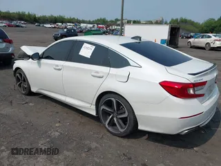2021 Honda Accord Sport with VIN 1HGCV2F38MA027279, listed as a IAAI auction lot 42452235 with 58,180 mi miles and . Bid and sale history available at DreamBid. Image 3.