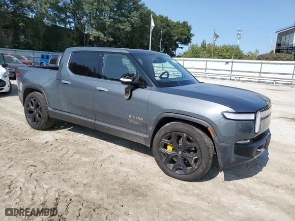 2022 Rivian R1T Adventure Package with VIN 7FCTGAAA7NN015041, listed as a Copart auction lot 70955194 with 45,469 mi miles and Salvage Title. Bid and sale history available at carsss.com. Image 4.