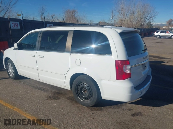 2015 Chrysler Town & Country LX with VIN 2C4RC1AG1FR678142, listed as a IAAI auction lot 41016680 with 78,756 mi miles and . Bid and sale history available at carsss.com. Image 3.