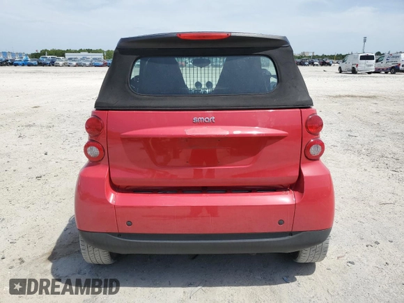 2009 Smart fortwo Passion z VIN WMEEK31XX9K306610, wystawiony jako Copart lot #57115125 z przebiegiem 5478 mil mil oraz Tytuł czysty. Historia ofert i sprzedaży dostępna na DreamBid. Obrazek 6.