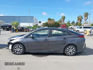 2022 Toyota Prius LE with VIN JTDKAMFP7N3206830, listed as a IAAI auction lot 41984239 with 57,681 mi miles and . Bid and sale history available at DreamBid. Image 14.