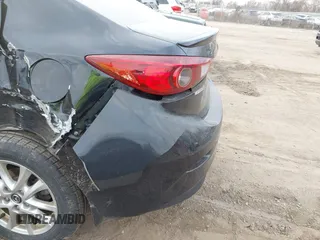 2016 Mazda 3 i Touring with VIN 3MZBM1V75GM311503, listed as a IAAI auction lot 41882706 with 131,123 mi miles and . Bid and sale history available at carsss.com. Image 18.