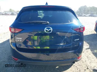 2018 Mazda CX-5 Grand Touring with VIN JM3KFADM1J0322049, listed as a IAAI auction lot 41891079 with 174,939 mi miles and . Bid and sale history available at DreamBid. Image 16.