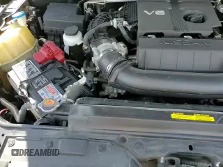 2023 Nissan Frontier SV z VIN 1N6ED1EJ4PN611550, wystawiony jako Copart lot #85756855 z przebiegiem 54 549 mil mil oraz Szkoda całkowita • Salvage title. Historia ofert i sprzedaży dostępna na DreamBid. Obrazek 13.