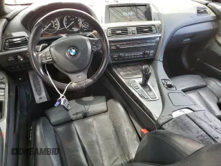 2013 BMW 6 Series 650i with VIN WBA6B2C59DDG66702, listed as a Copart auction lot 52327905 with 112,300 mi miles and Salvage Title. Bid and sale history available at DreamBid. Image 8.