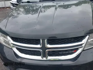 2016 Dodge Journey SXT with VIN 3C4PDCBG2GT100550, listed as a IAAI auction lot 41982670 with 184,601 mi miles. Bid and sale history available at carsss.com. Image 10.