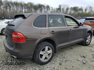 2009 Porsche Cayenne z VIN WP1AA29P79LA04909, wystawiony jako Copart lot #47720915 z przebiegiem 208 619 mil mil oraz Szkody całkowita. Historia ofert i sprzedaży dostępna na DreamBid. Obrazek 3.