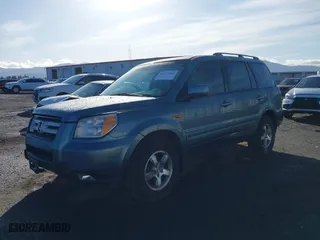 2006 Honda Pilot EX-L with RES with VIN 2HKYF18666H511059, listed as a IAAI auction lot 41719613 with 143,084 mi miles. Bid and sale history available at carsss.com. Image 17.