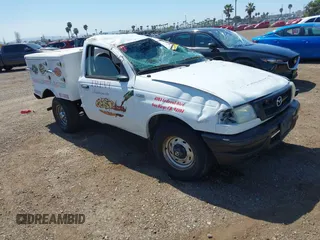 2002 Mazda B-Series Truck SX with VIN 4F4YR12D42TM16317, listed as a IAAI auction lot 41859988 with 220,933 mi miles and . Bid and sale history available at DreamBid. Image 1.