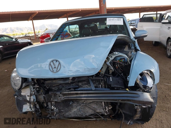 2013 Volkswagen Beetle 2.5L with VIN 3VW5P7AT9DM830477, listed as a IAAI auction lot 41957389 with Not Provided miles and . Bid and sale history available at DreamBid. Image 12.