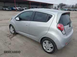 2015 Chevrolet Spark LS with VIN KL8CB6S95FC736907, listed as a IAAI auction lot 42170458 with 102,915 mi miles and . Bid and sale history available at DreamBid. Image 3.