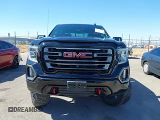 2021 GMC Sierra 1500 AT4 with VIN 3GTP9EED5MG206008, listed as a IAAI auction lot 41665423 with 61,685 mi miles. Bid and sale history available at carsss.com. Image 6.