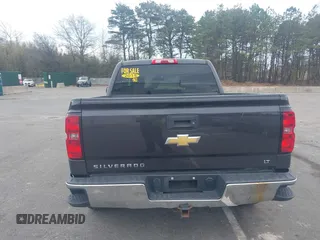 2015 Chevrolet Silverado 1500 LT with VIN 3GCUKREC9FG519510, listed as a IAAI auction lot 42026865 with 119,510 mi miles and . Bid and sale history available at DreamBid. Image 16.