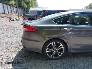 2019 Ford Fusion Titanium with VIN 3FA6P0D93KR124299, listed as a IAAI auction lot 40182478 with 73,408 mi miles. Bid and sale history available at carsss.com. Image 20.