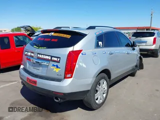 2014 Cadillac SRX with VIN 3GYFNAE31ES576016, listed as a IAAI auction lot 42130992 with 160,114 mi miles and . Bid and sale history available at DreamBid. Image 4.