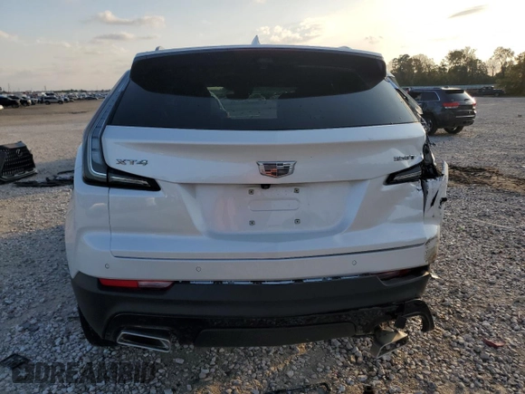 2022 Cadillac XT4 FWD Sport with VIN 1GYFZER48NF169913, listed as a Copart auction lot 84457034 with 36,406 mi miles and Clean title. Bid and sale history available at DreamBid. Image 6.