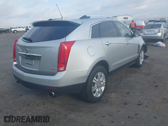 2015 Cadillac SRX Luxury Collection with VIN 3GYFNBE3XFS612048, listed as a IAAI auction lot 41923525 with 154,621 mi miles. Bid and sale history available at carsss.com. Image 4.