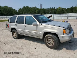 1998 Jeep Grand Cherokee Limited with VIN 1J4GZ78Y5WC324828, listed as a Copart auction lot 58992125 with 225,705 mi miles and Salvage title. Bid and sale history available at DreamBid. Image 4.