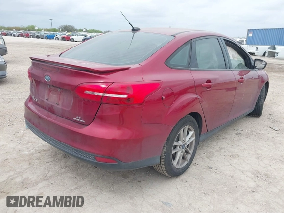 2016 Ford Focus SE with VIN 1FADP3F29GL314851, listed as a IAAI auction lot 41881982 with 130,888 mi miles. Bid and sale history available at carsss.com. Image 4.