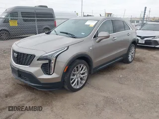2023 Cadillac XT4 FWD Luxury z VIN 1GYAZAR43PF152992, wystawiony jako IAAI lot #42160015 z przebiegiem 29 466 mil mil oraz . Historia ofert i sprzedaży dostępna na DreamBid. Obrazek 2.