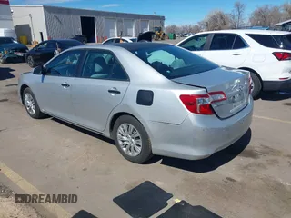 2014 Toyota Camry L with VIN 4T1BF1FK6EU367454, listed as a IAAI auction lot 41871829 with 140,696 mi miles and . Bid and sale history available at DreamBid. Image 3.
